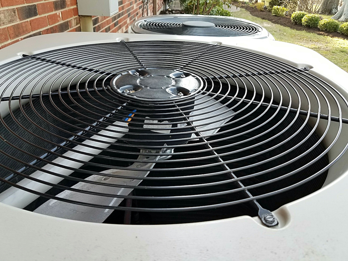 Outdoor air conditioner unit up close.