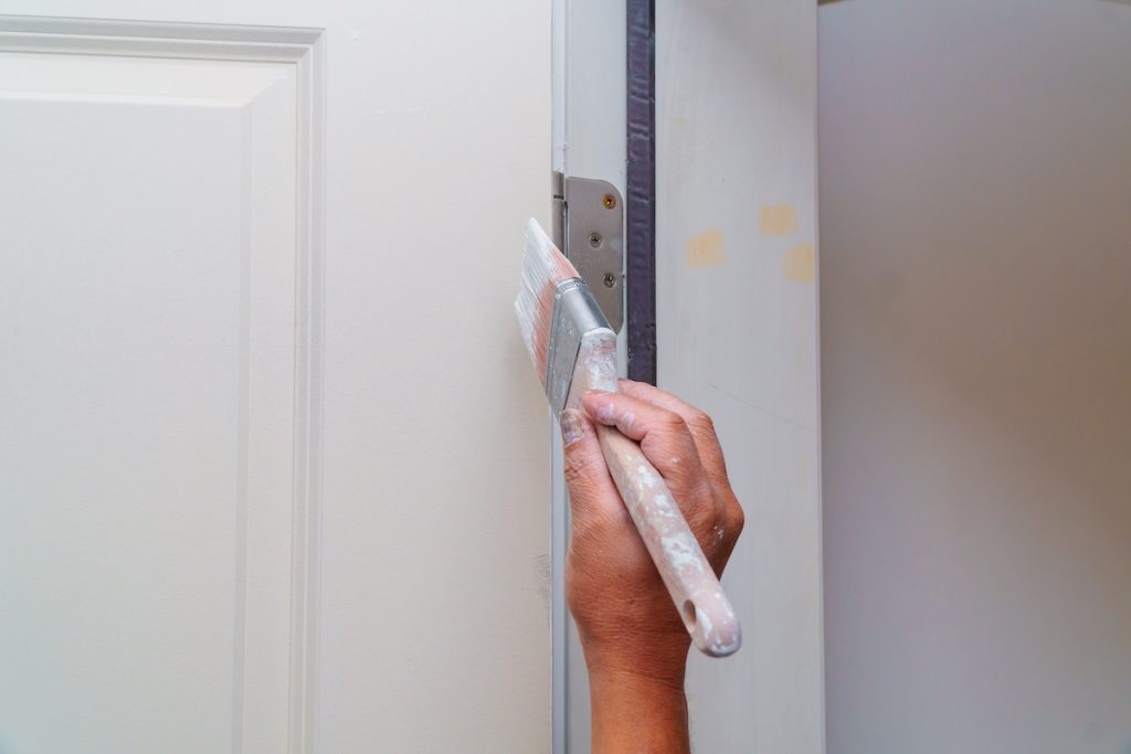 Your Guide To Fixing a Broken Door 4 This image has an empty alt attribute; its file name is paintingadoor-1024x683.jpg